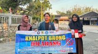 Mahasiswa Tim II KKN UNDIP saat melakukan kampanye kesadaran hokum terkait knalpot brong di Desa Bumiharjo, (7/8/2024). (doc. Pribadi)