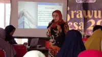 Ketua DPC PERADI Malang Raya, Naily Ariyani, S.H., M.H., memaparkan materi tentang Nomor Induk Berusaha (NIB) dalam sosialisasi Balesari Legal Care di Desa Balesari, Kecamatan Ngajum, Kabupaten Malang, Jumat (23/10/2026). (Dok. Pribadi) Ketua DPC PERADI Malang Raya, Naily Ariyani, S.H., M.H., memaparkan materi tentang Nomor Induk Berusaha (NIB) dalam sosialisasi Balesari Legal Care di Desa Balesari, Kecamatan Ngajum, Kabupaten Malang, Jumat (23/10/2026). (Dok. Pribadi)